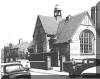 Harry Cotton outside Mill Lane School (for boys) 